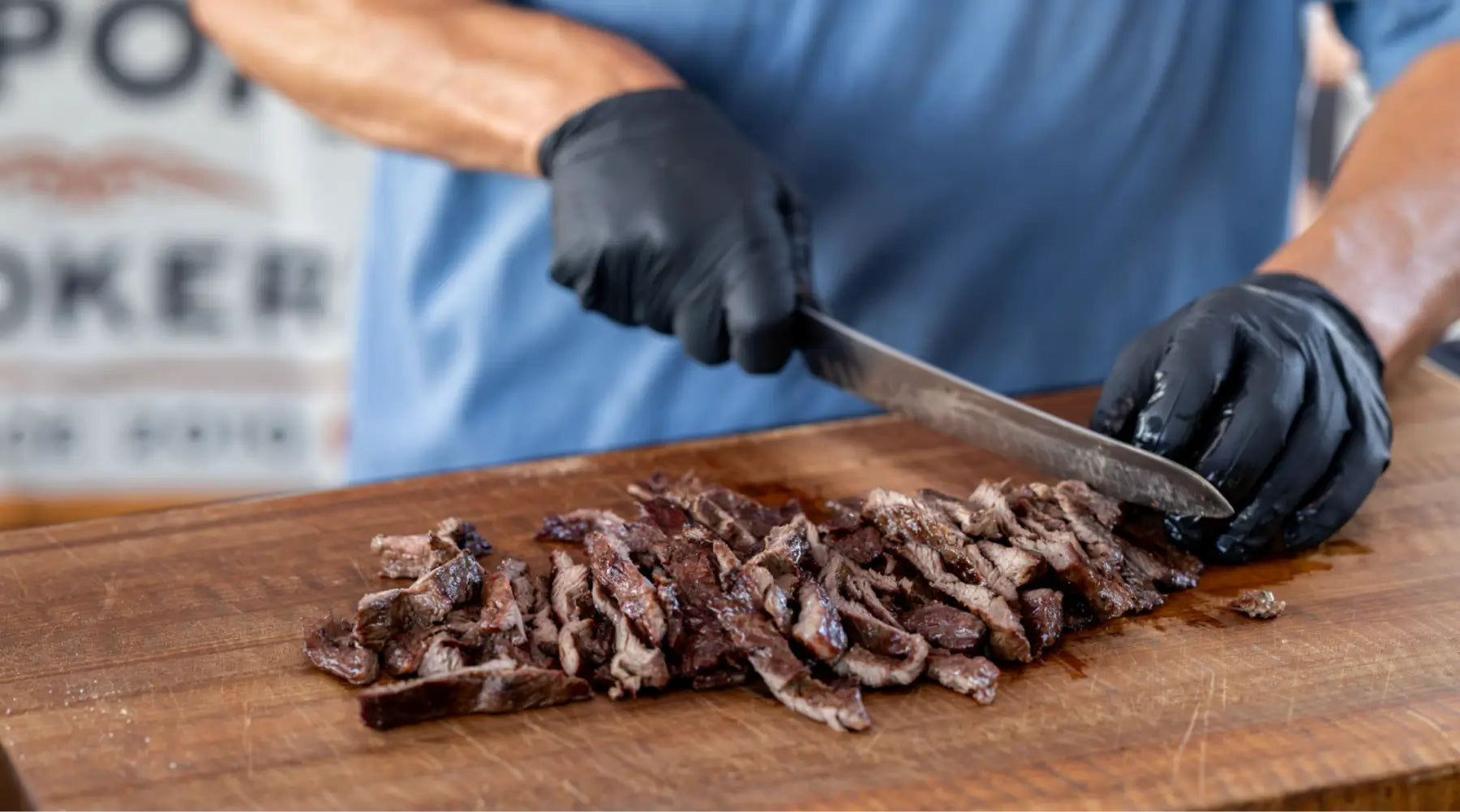 slicing meat on a cutting board