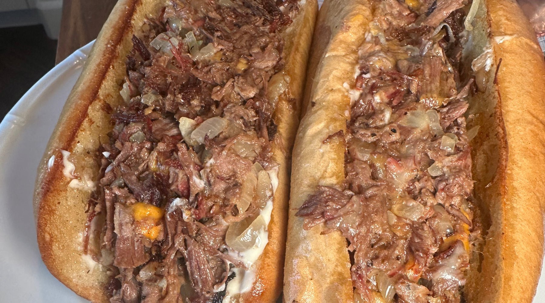 Leftover brisket cheesesteak hoagie sandwich