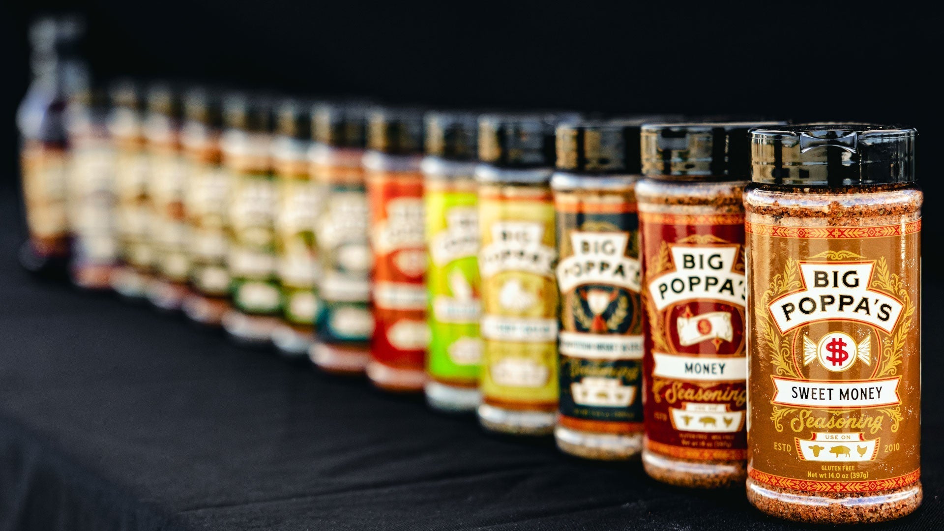 The Big Poppa Smokers collection on a black backdrop all lined up.