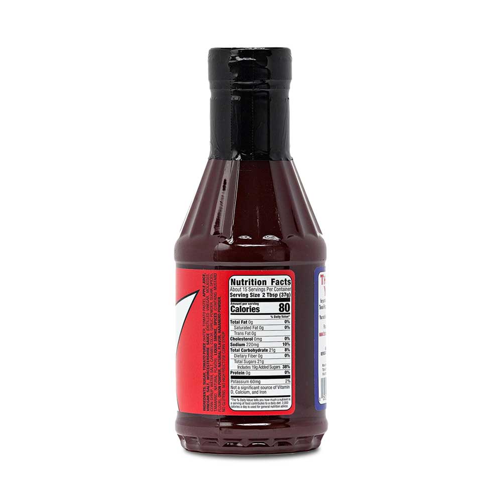 Bottle of Texas Pepper Jelly Craig’s BBQ Sauce, showcasing its vibrant label and promising a blend of sweet and spicy flavors ideal for enhancing meats and sides in both competitive and casual BBQ settings. The nutrition facts are showing.