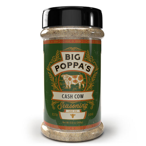 Jar of "big poppa's cash cow seasoning" with a green label, featuring a cow illustration, positioned on a white background.