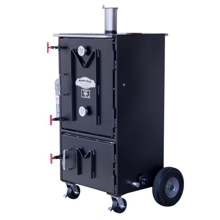 Angled front view of the Meadow Creek BX50 Box Smoker, showing the two compartments, thermometer on the upper door.