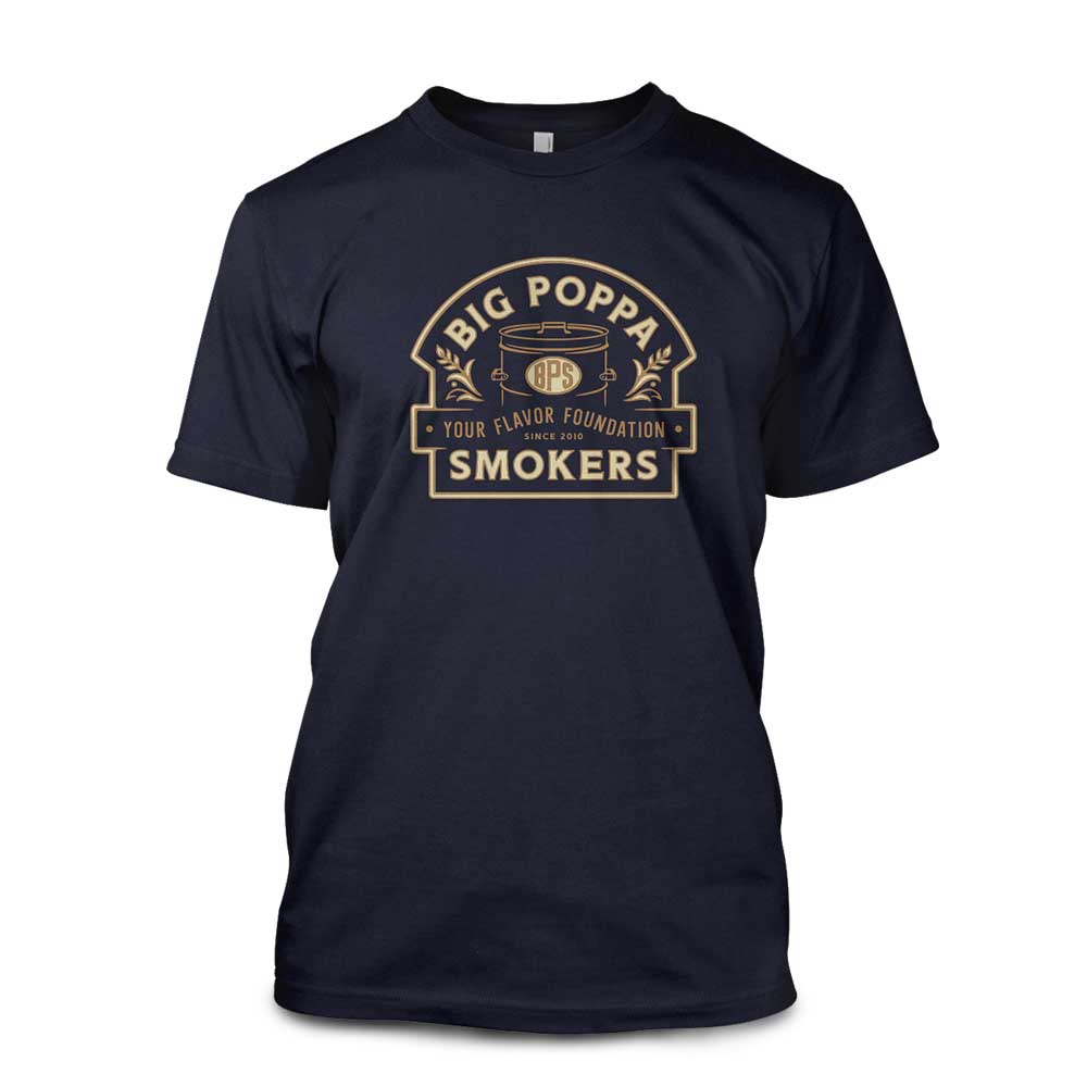 Navy T-shirt with tan and gold Big Poppa Smokers logo, smoker graphic, and tagline: "Your Flavor Foundation – Since 2010."