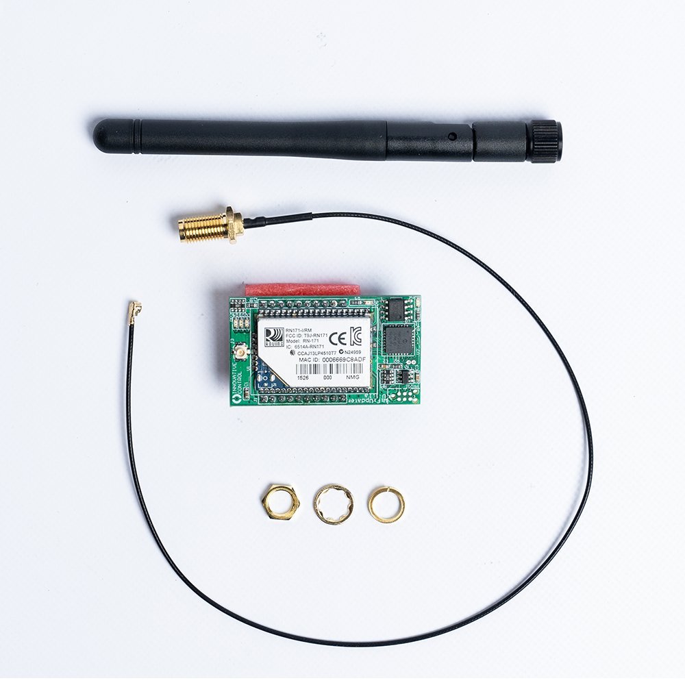 Upclose of the components that make up the mobile settings, including probe, wires and electronic chip.