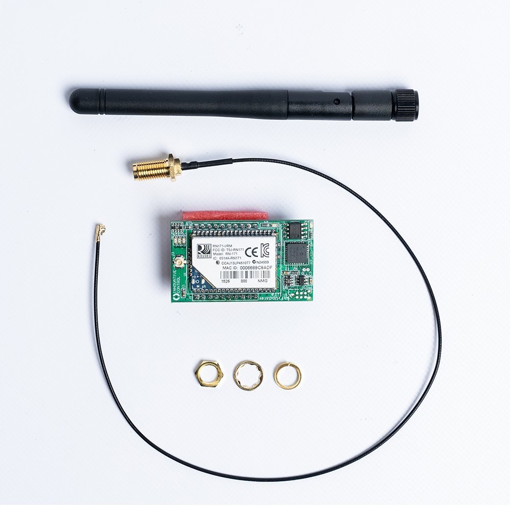 Upclose of the components that make up the mobile settings, including probe, wires and electronic chip.