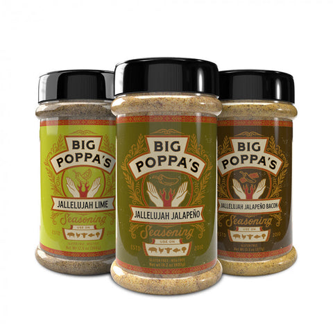 Three bottles of Big Poppa's seasoning lined up, labeled from left to right: Jallelujah Lime, Jallelujah Jalapeño, and Jallelujah Jalapeño Bacon. Each bottle features a unique, ornate label design with elements like lime wedges and jalapeño peppers, set against a golden background with red and green decorative elements.
