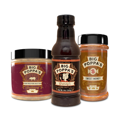 Three products from Big Poppa's line displayed side by side. From left to right: a jar of Pork Prod Pork Injection Seasoning with a rich burgundy label, a bottle of Granny's BBQ Sauce in a dark brown bottle with a vintage-style label, and a jar of Sweet Money Seasoning with a golden orange label. Each container features elaborate decorative elements and the Big Poppa's brand logo, emphasizing a unified theme of quality and flavor.