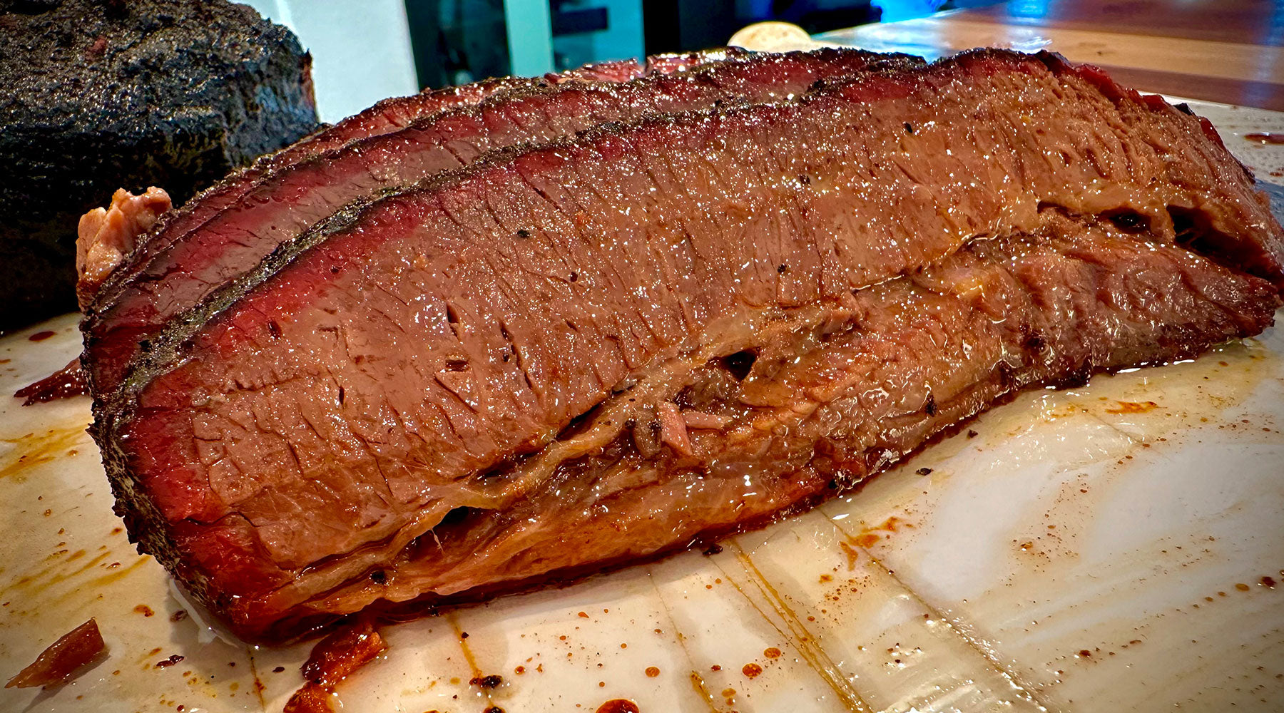 How to Cook a Brisket: Mastering Low and Slow with Big Poppa Smokers