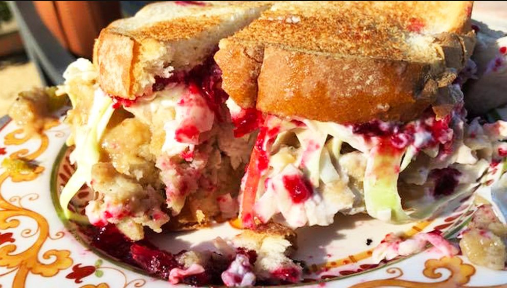 The ultimate leftover Thanksgiving sandwich with turkey, dressing, slaw and more.