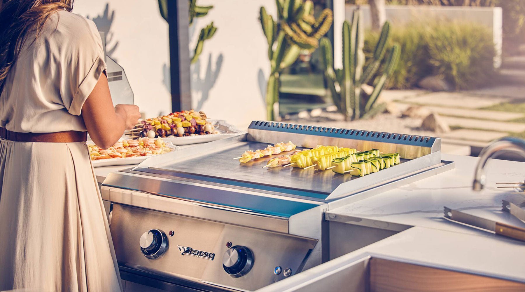 Wife cooking outside on the griddle
