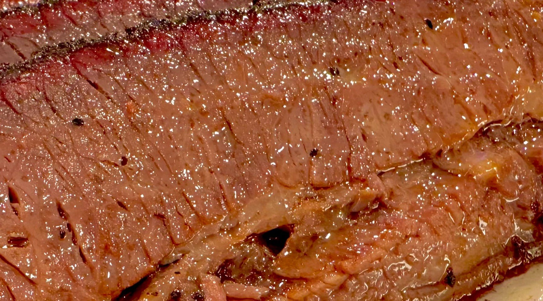 Brisket that is sliced and ready to eat.