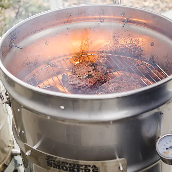 Big Poppa Smokers drum that is ready to cook ribs.