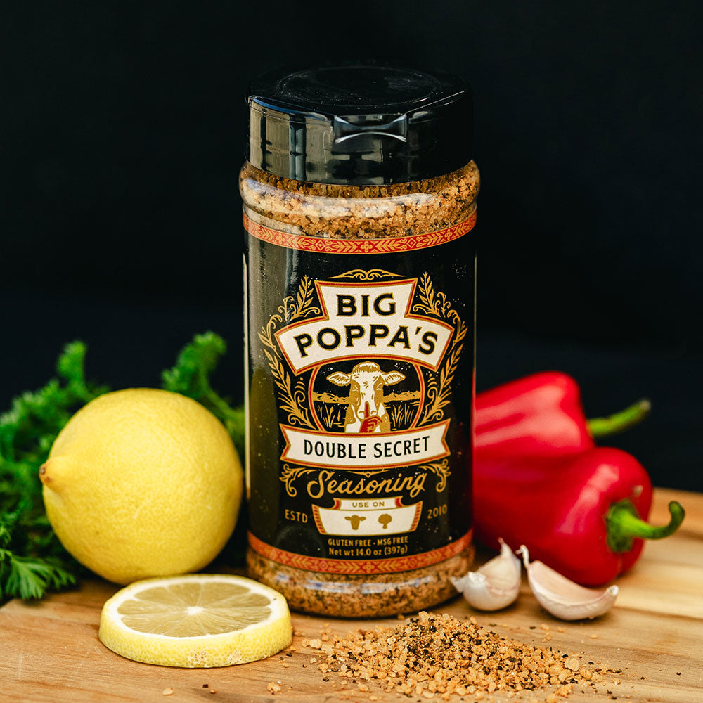 One of the many products that are in the Big Poppa's Featured Collection includes Double Secret Steak Seasoning.  This picture features lemon, peppers and garlic all key ingredients. 