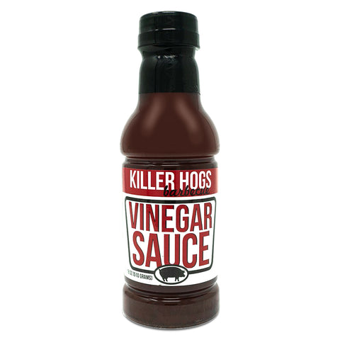 Bottle of Killer Hogs Vinegar Sauce, featuring a label that highlights its West Tennessee roots with a blend of vinegar and tomato for a classic BBQ flavor. Ideal for enhancing pork ribs, brisket, and chicken with a thin, versatile consistency.