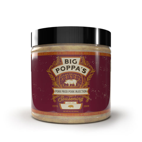 A jar of Big Poppa's Pork Prod Pork Injection Seasoning with a deep red label decorated with golden ornamental patterns, showcasing a pig illustration and highlighting its establishment in 2009.