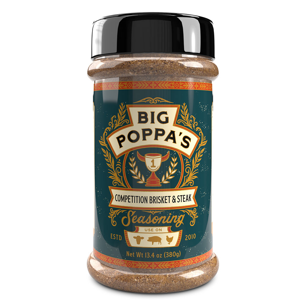 A bottle of Big Poppa's Competition Brisket & Steak Seasoning. The bottle has a deep teal label adorned with golden laurels and a trophy illustration, indicating its use for competitive cooking, established in 2010.