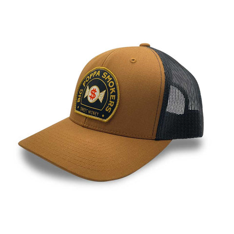 A caramel-colored trucker hat featuring a prominent embroidered patch on the front. The patch displays the "Big Poppa Smokers" logo with a winged dollar sign motif and the words "Sweet Money" in elegant script. The front of the cap is solid fabric, and the back consists of black mesh for breathability, presented on a neutral background.