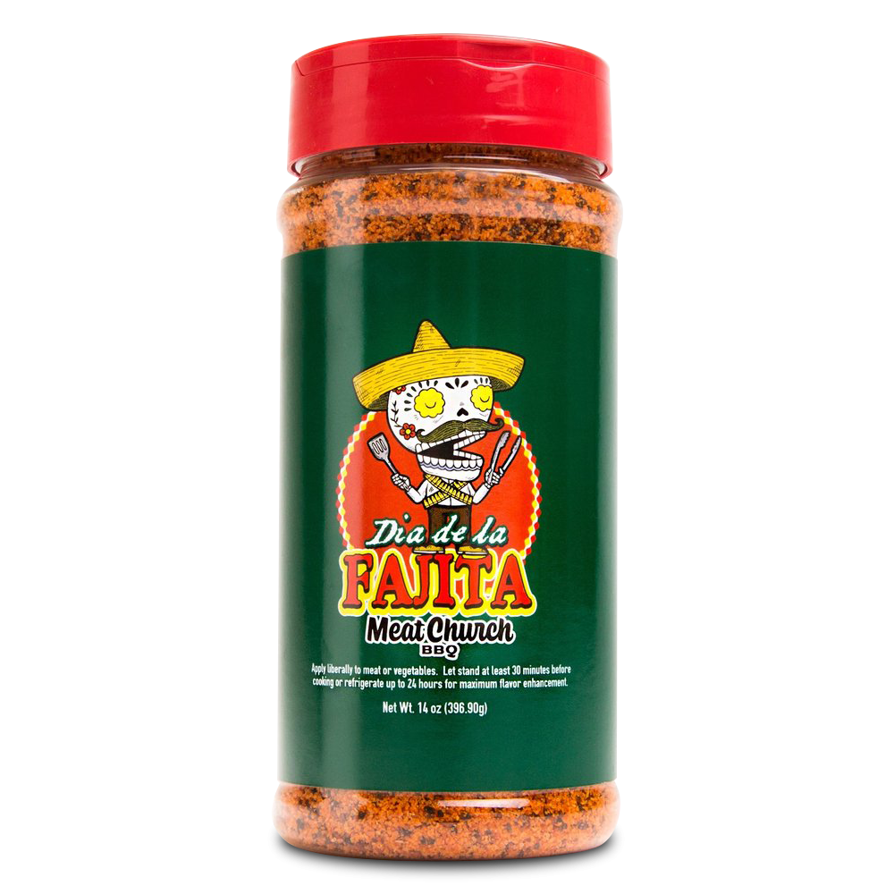 A 14-ounce jar of Meat Church Dia de la Fajita Seasoning. The label is green with red and yellow text and features a cartoon skeleton wearing a sombrero, holding grilling tools. The jar has a red lid and contains a coarse, reddish-brown spice mix.