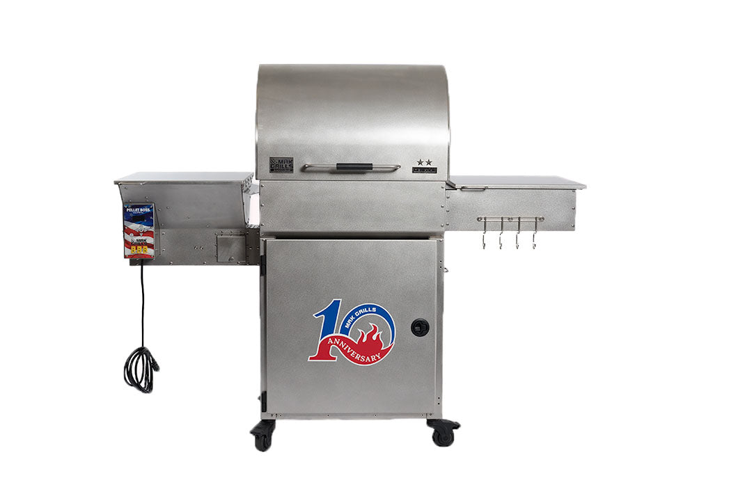 A stainless steel grill with a closed lid and a "10th Anniversary" logo on the front. The grill includes side shelves, a storage compartment, and a set of hooks for utensils. An electrical cord is visible on the left side.