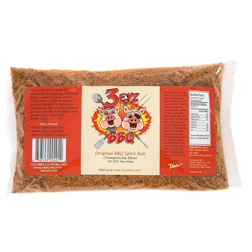 3 Eyz BBQ Original BBQ Spice Rub in a clear plastic bag with a red and beige label featuring three cartoon pigs, set against a plain white background.