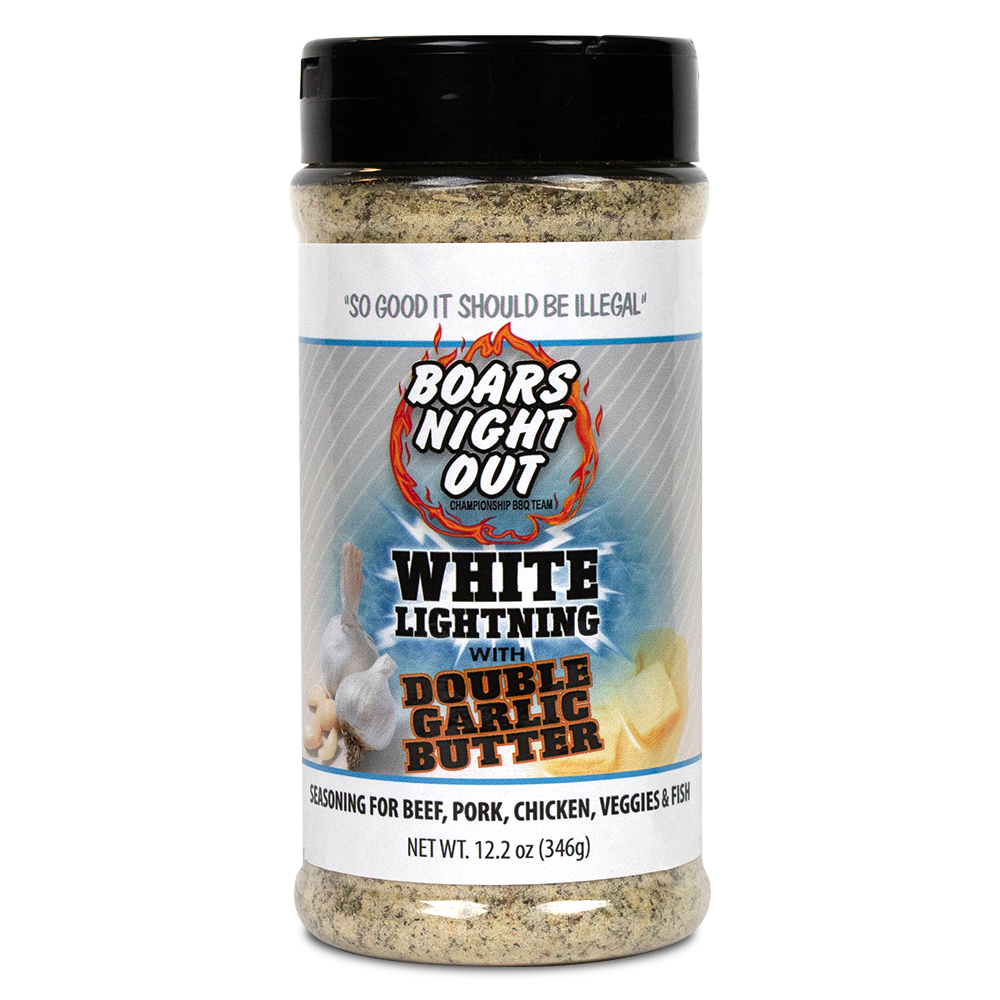 The front of a jar of Boars Night Out White Lightning with Double Garlic Butter seasoning with a black lid. The label features the text 'So good it should be illegal' at the top, followed by the Boars Night Out logo with a flaming design. Below, the label reads 'White Lightning with Double Garlic Butter' and specifies that the seasoning is for beef, pork, chicken, veggies, and fish. The net weight is 12.2 ounces (346 grams).