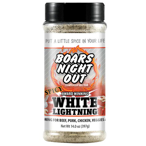The front of a jar of Boars Night Out Spicy White Lightning seasoning with a black lid. The label features the text 'Put a Little Spice in Your Life' at the top, followed by the Boars Night Out logo with a flaming design. Below, the label reads 'Spicy Award Winning White Lightning' and specifies that the seasoning is suitable for beef, pork, chicken, and veggies. The net weight is 14.0 ounces (397 grams).
