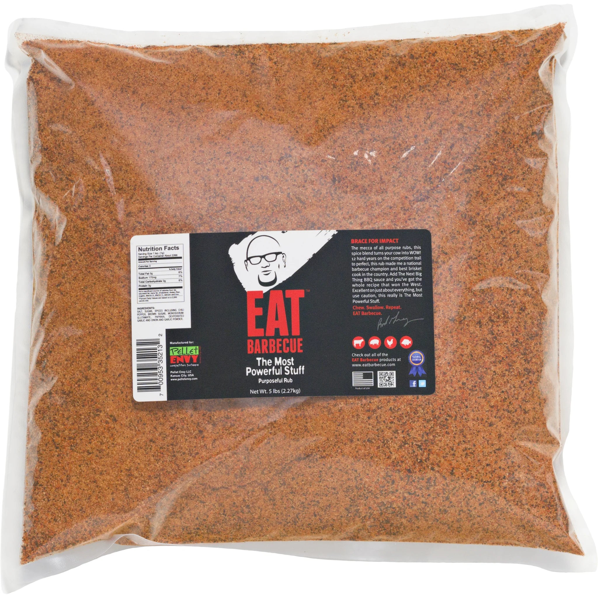 A large vacuum-sealed bag of EAT Barbecue "The Most Powerful Stuff" BBQ rub weighing 5 lbs (2.27kg). The label features the same cartoon image of a bald man wearing glasses with the text "EAT Barbecue" in red. The bag includes a nutrition facts panel and a barcode.