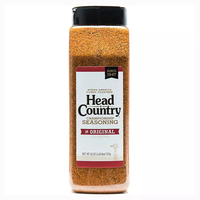 A large bottle of Head Country Championship Seasoning displayed against a white background. The label highlights "The Original" flavor, is gluten-free, and mentions the brand's establishment since 1947.