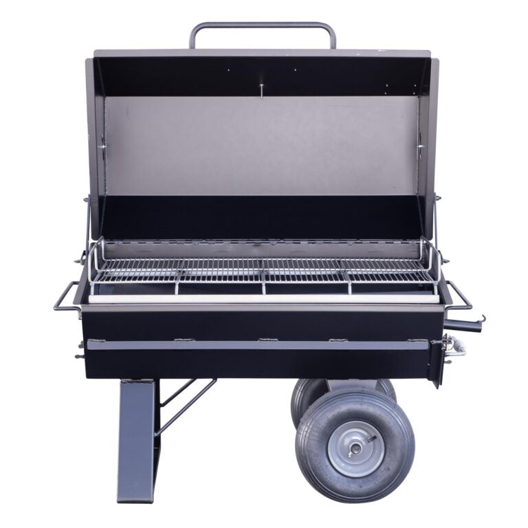 A front view of the Meadow Creek PR42 pig roaster, showcasing the dual-layer grilling racks and the sturdy design of the unit.