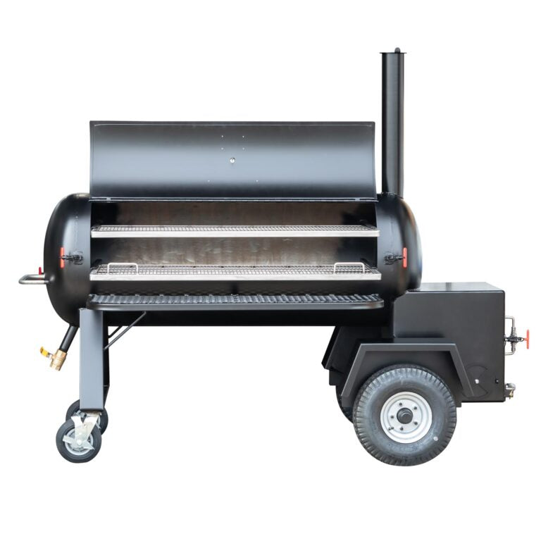 A black Meadow Creek BBQ smoker with an open cooking chamber, showing two stainless steel grates inside.