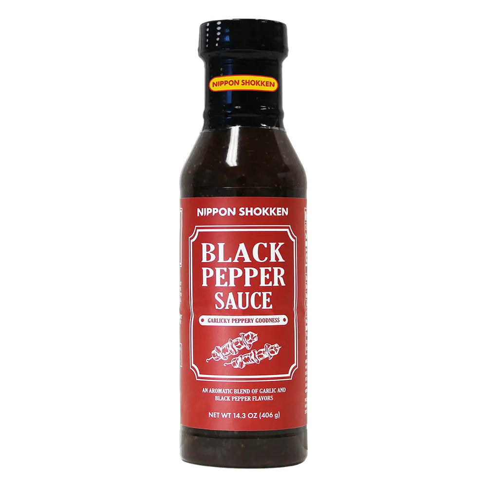 Bottle of Nippon Shokken Black Pepper Sauce on a white background