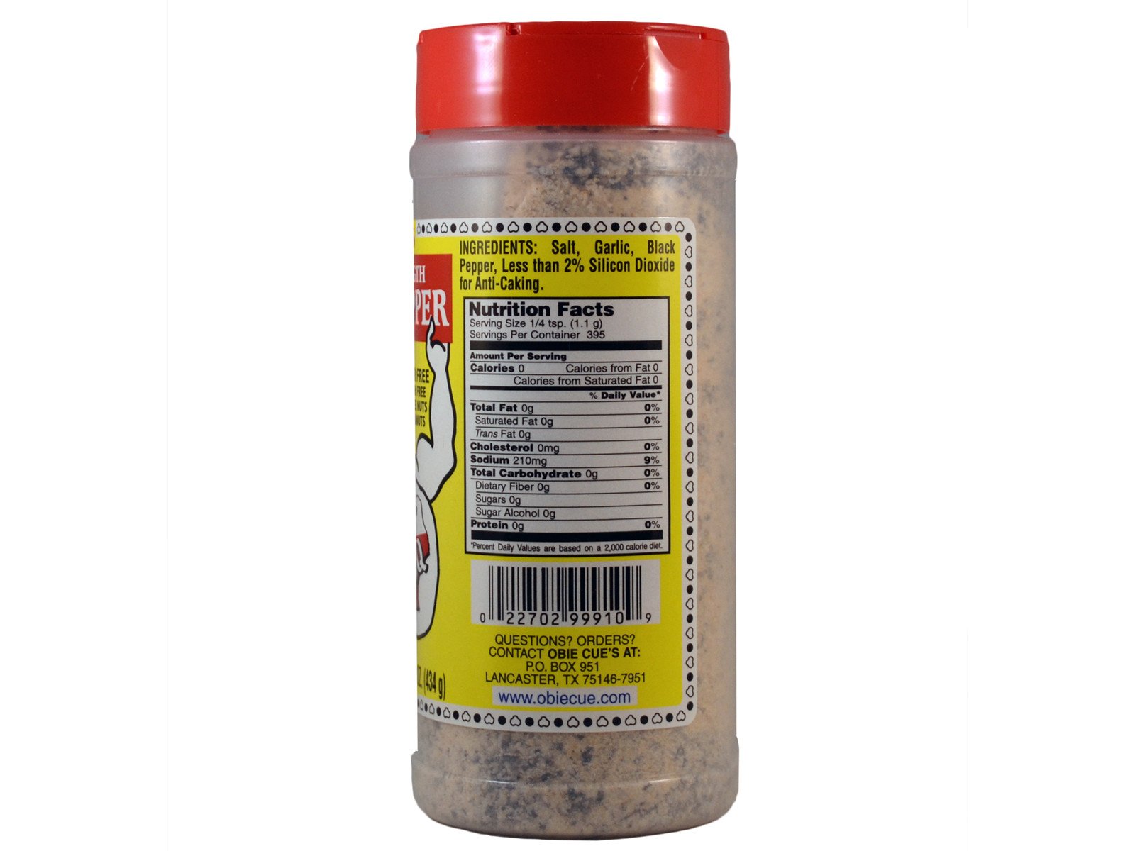 Back view of Obie-Cue's Double Strength Garlic Pepper bottle. The label provides nutritional information and ingredients such as salt, garlic, black pepper, and silicon dioxide. It also states the product is free of gluten, peanuts, and tree nuts.