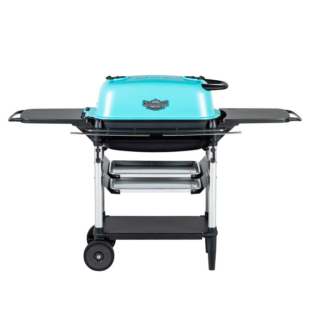 Front view of a PK Franklin charcoal grill with a teal lid. The grill features side shelves, two trays below the grilling area, and a lower storage shelf. One side of the grill has wheels for easy mobility.