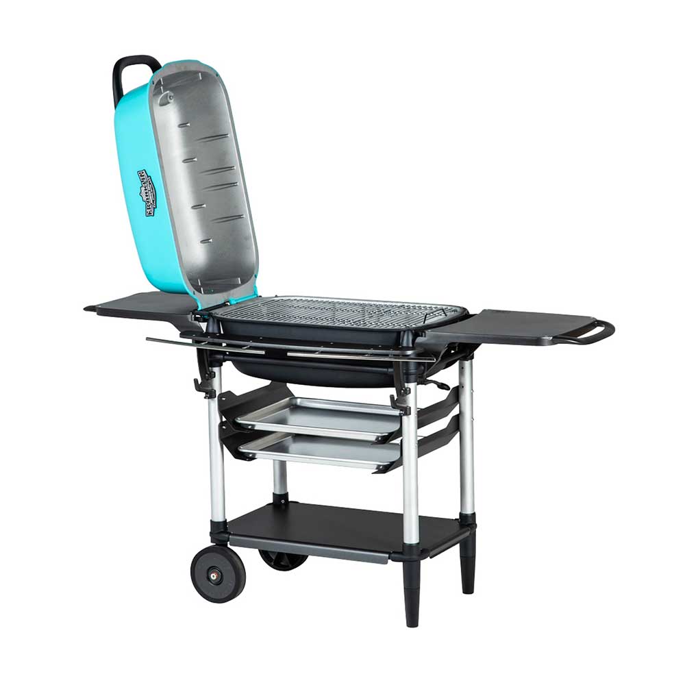 Side view of a PK Franklin charcoal grill with a teal lid open, revealing the grilling area. The grill features side shelves and two trays beneath the grilling area for added storage.