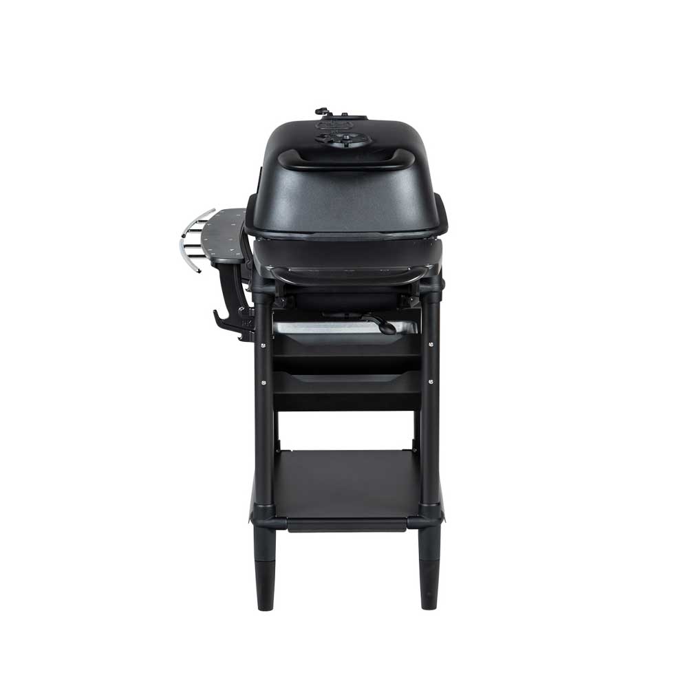 Side view of a PK Franklin charcoal grill with a black lid. The grill is equipped with a side shelf and two trays beneath the grilling area for convenient storage.