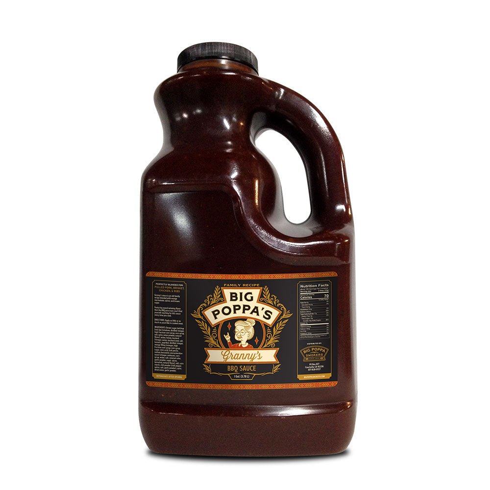 A large plastic jug of Big Poppa's Granny's BBQ Sauce. The jug is dark brown with a black cap and a handle, and features a detailed label in yellow and white text on a dark background, emphasizing the homemade style of the sauce.