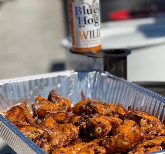 Chicken wings that were glazed with Blues Hog Wild Wing Sauce.