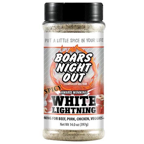 The front of a jar of Boars Night Out Spicy White Lightning seasoning with a black lid. The label features the text 'Put a Little Spice in Your Life' at the top, followed by the Boars Night Out logo with a flaming design. Below, the label reads 'Spicy Award Winning White Lightning' and specifies that the seasoning is suitable for beef, pork, chicken, and veggies. The net weight is 14.0 ounces (397 grams).