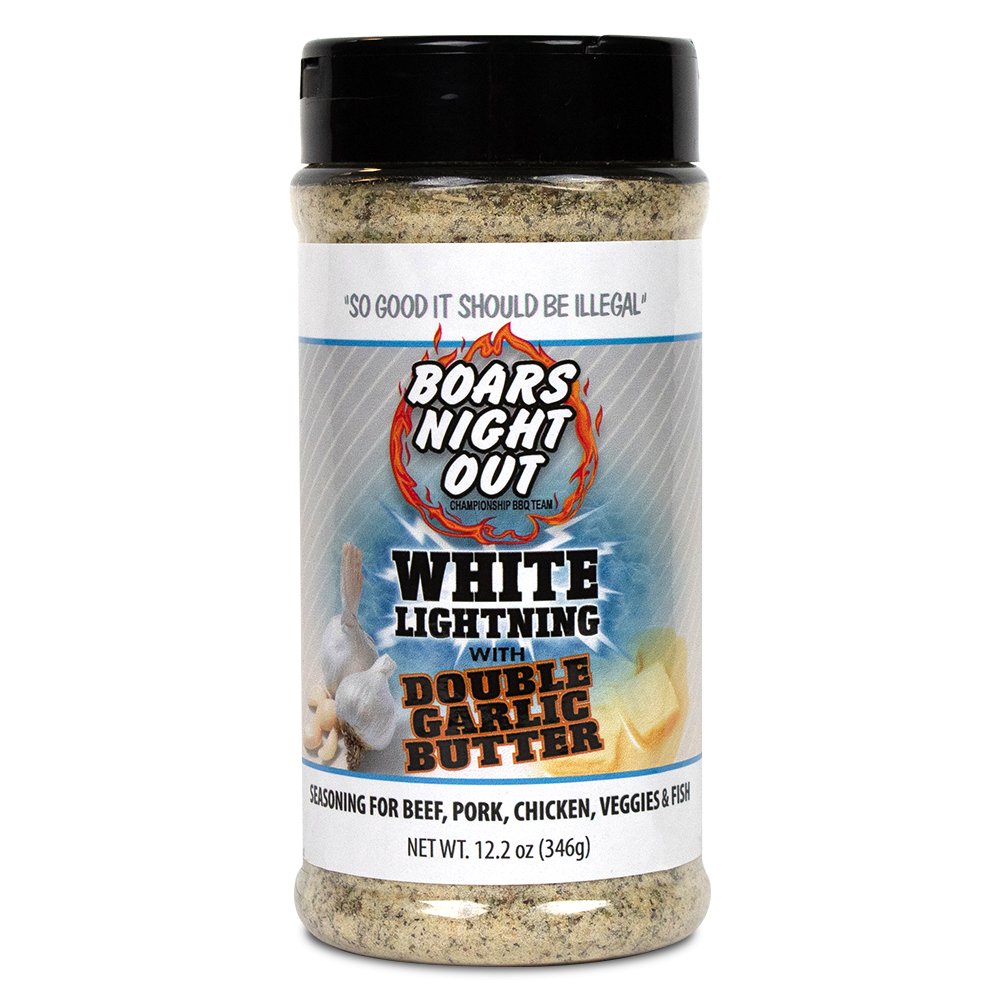 The front of a jar of Boars Night Out White Lightning with Double Garlic Butter seasoning with a black lid. The label features the text 'So good it should be illegal' at the top, followed by the Boars Night Out logo with a flaming design. Below, the label reads 'White Lightning with Double Garlic Butter' and specifies that the seasoning is for beef, pork, chicken, veggies, and fish. The net weight is 12.2 ounces (346 grams).