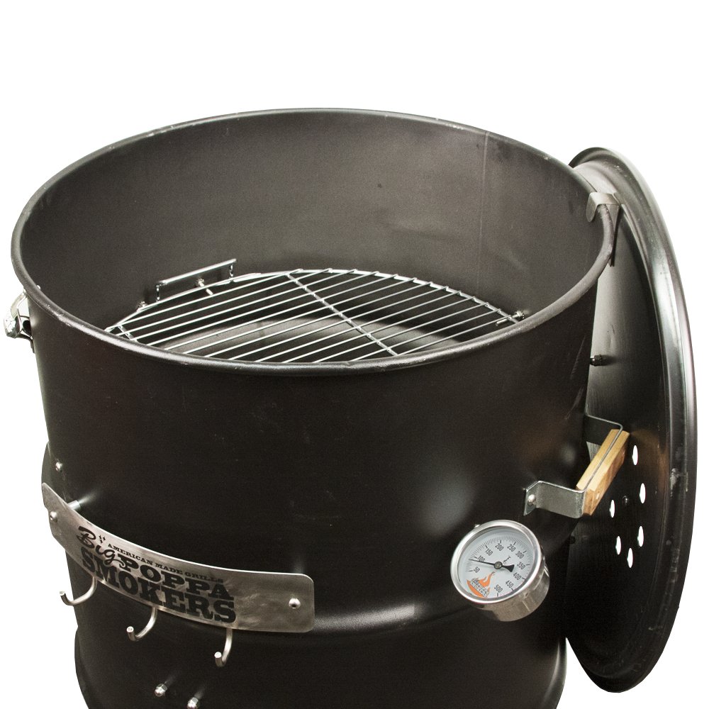 Close-up of the top section of an assembled black BPS DIY Drum Smoker featuring a thermometer and top vent, showcasing the grill cooking grate inside.