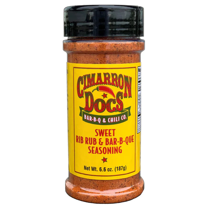The front of a jar of Cimarron Doc's Sweet Rib Rub & Bar-B-Q Seasoning with a black lid. The label is yellow with red and green accents and reads 'Cimarron Doc's Bar-B-Q & Chili Co. Sweet Rib Rub & Bar-B-Q Seasoning.' The net weight is 6.6 ounces (187 grams).