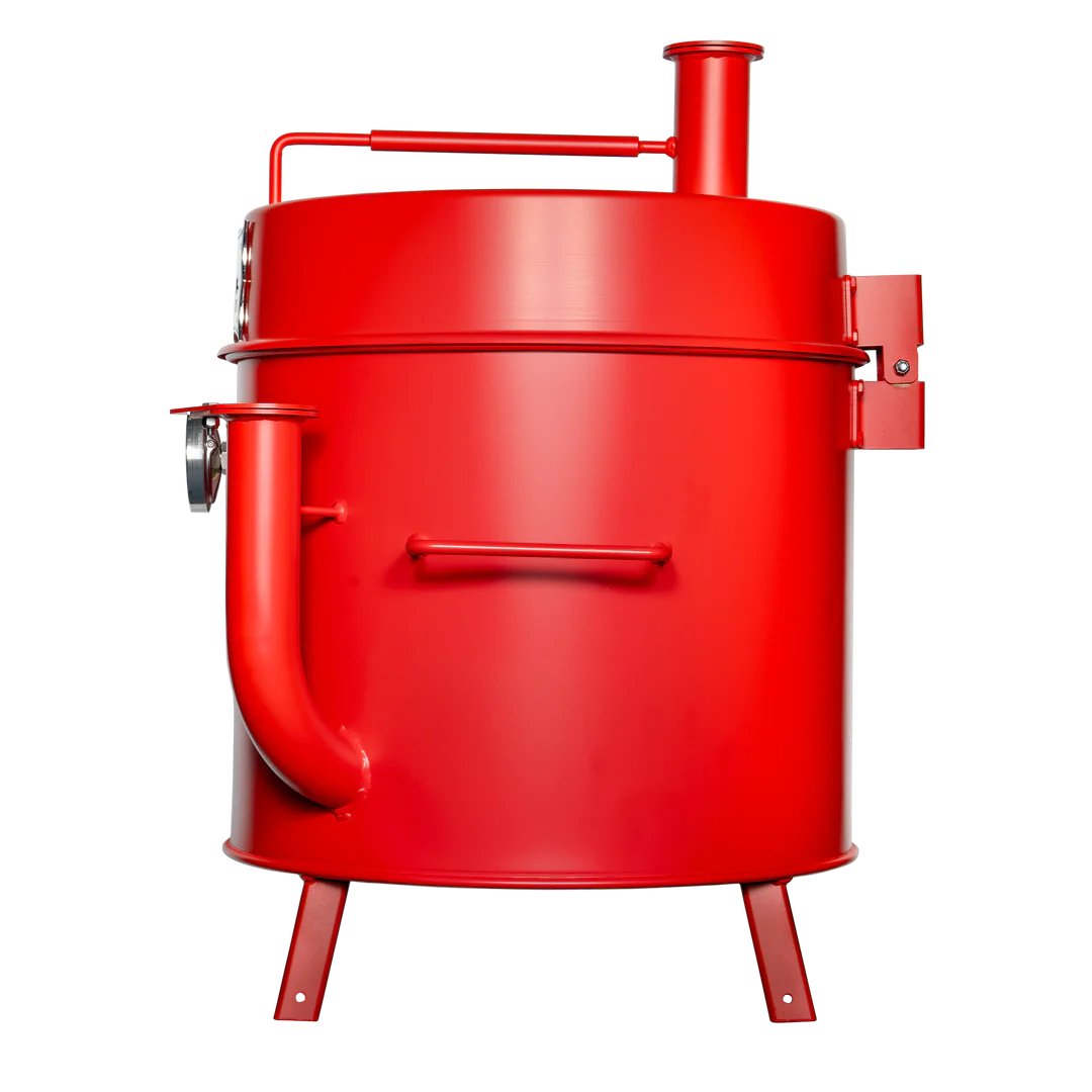 The side view of a red mini drum smoker, displaying its simple, cylindrical design with a smoke stack on top.