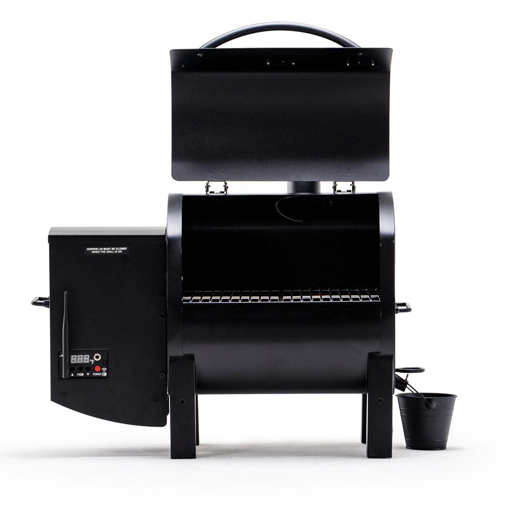 A grill with the lid open, showing the cooking grates inside, against a plain white background.