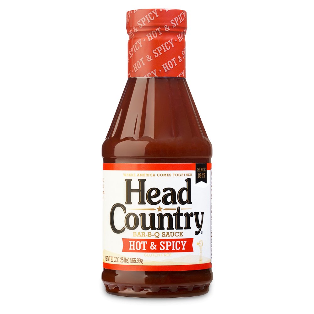 20 oz bottle of Head Country Hot BBQ Sauce, prominently labeled as Oklahoma's #1 BBQ sauce since 1947, perfect for adding a spicy kick to various dishes. This sauce is free from MSG, gluten, and allergens, ensuring a bold and clean flavor.