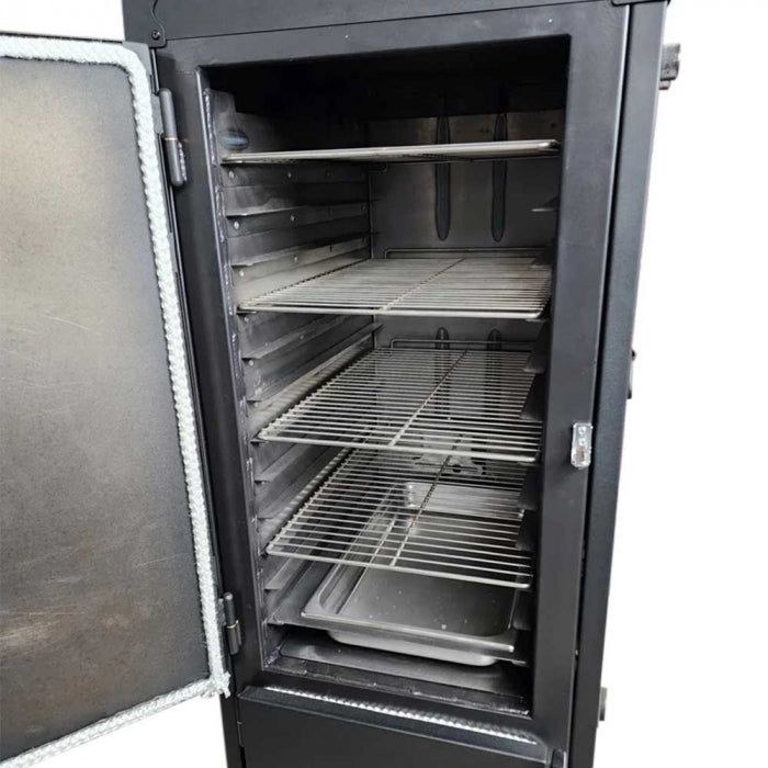 The interior of a vertical BBQ smoker with the door open, showing multiple metal racks and a drip pan at the bottom.