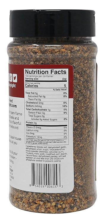 The back of a Killer Hogs Steak Rub bottle showing the nutrition facts label. The label states a serving size of 1/4 teaspoon (0.6g), with 5 calories per serving. It contains 0g total fat, 0mg cholesterol, 150mg sodium, 1g total carbohydrate, 0g dietary fiber, 0g total sugars with 0g added sugars, and 0g protein. Ingredients include spices, salt, dehydrated garlic, and other natural flavors.