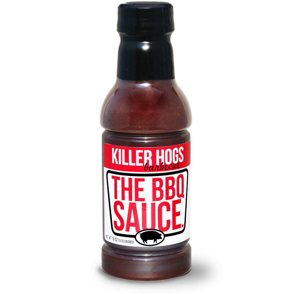 Bottle of Killer Hogs The BBQ Sauce, prominently displaying its label, ideal for adding a flavorful punch to any BBQ dish with its perfect blend of heat, sweetness, and tanginess. Great for both competitive and backyard BBQs.