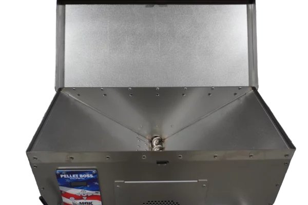 Interior view of a MAK Grills pellet smoker with a triangular hopper and exposed auger system at the bottom.