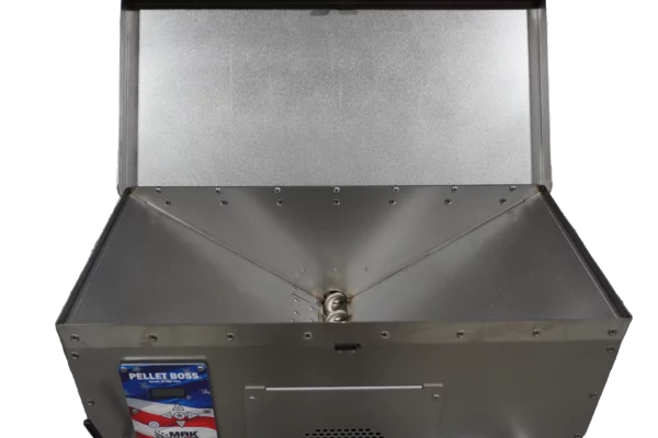Interior view of a MAK Grills pellet smoker with a triangular hopper and exposed auger system at the bottom.