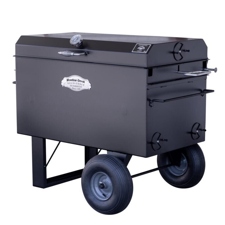 Side view of the Meadow Creek BBQ42 Chicken Cooker focusing on the vent and handle on the side. The cooker is designed for efficient air control and easy maneuverability.